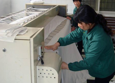 小妙招辅助酒店用洗涤机械保证布品光鲜清洁